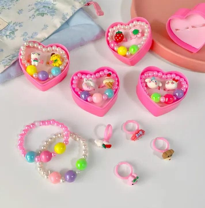 "Adorable Silicone Jewelry Set in Heart-Shaped Box: 1 Baby Bracelet, Hand Band & 2 Rings – Perfect Gift for Baby Girls!" image 1